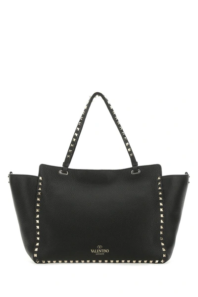 Shop Valentino Garavani Rockstud Medium Tote Bag In Black