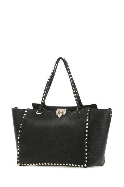 Shop Valentino Garavani Rockstud Medium Tote Bag In Black