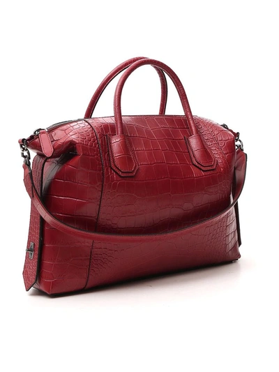 Shop Givenchy Medium Antigona Embossed Soft Bag In Red