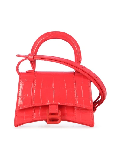 Shop Balenciaga Hourglass Mini Top Handle Bag In Red