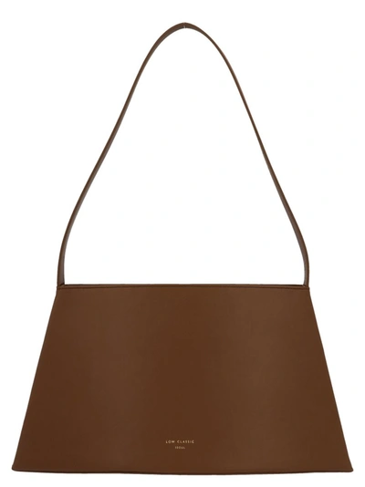 Shop Low Classic Curve Shoulder Bag In Brown
