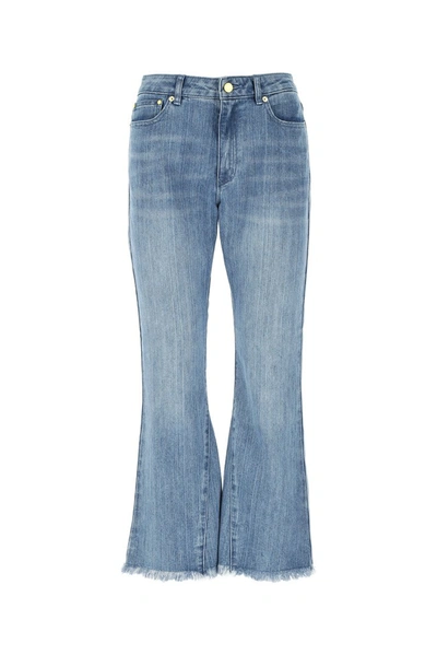 Shop Michael Michael Kors Cropped Flare Jeans In Blue