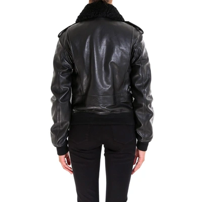 Shop Saint Laurent Studded Leather Jacket In Black