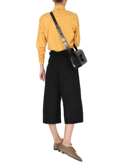 Shop Lemaire Pleated Cropped Pants In Black