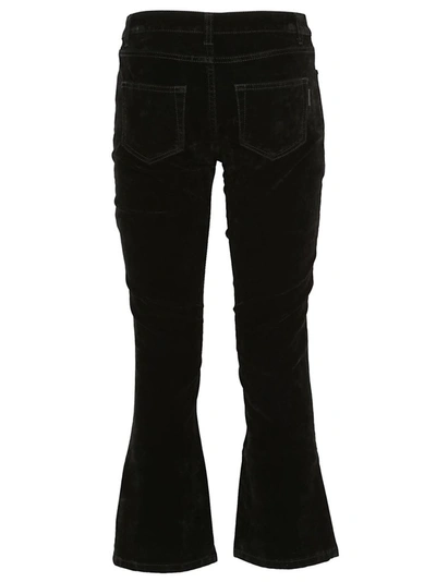 Shop Saint Laurent Cropped Flared Jeans In Black