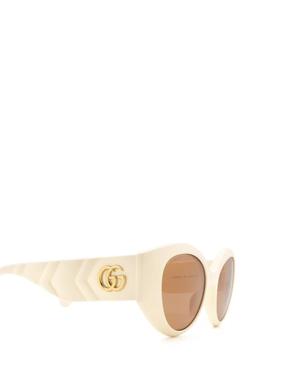 Shop Gucci Eyewear Cat Eye Frame Sunglasses In White