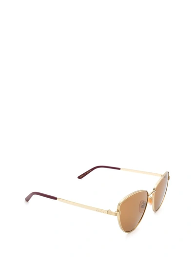 Shop Gucci Eyewear Cat Eye Frame Sunglasses In Gold