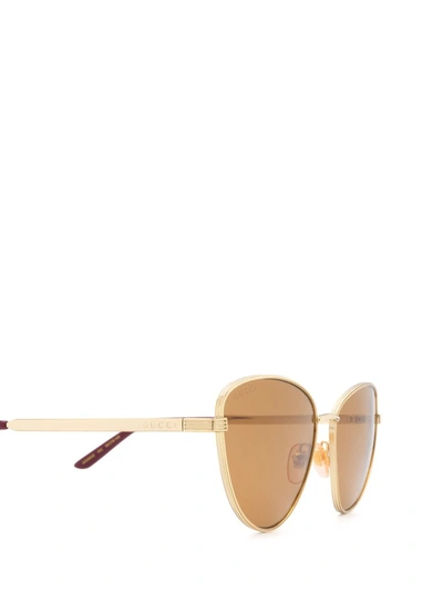 Shop Gucci Eyewear Cat Eye Frame Sunglasses In Gold