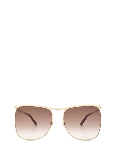 Shop Gucci Eyewear Oversized Frame Sunglasses In Gold