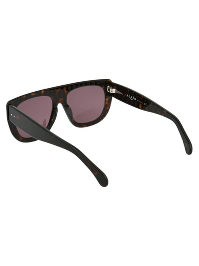 Shop Alaïa Square Frame Sunglasses In Brown
