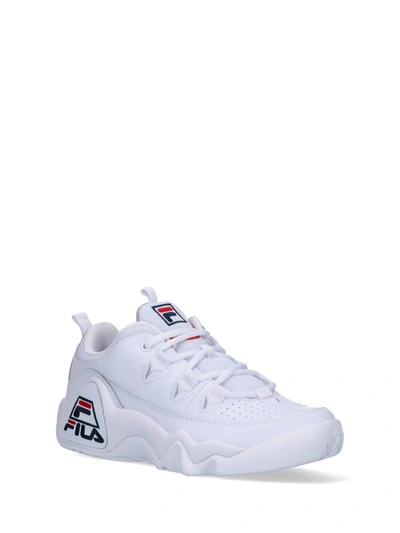 Shop Fila Logo Low Top Sneakers In White