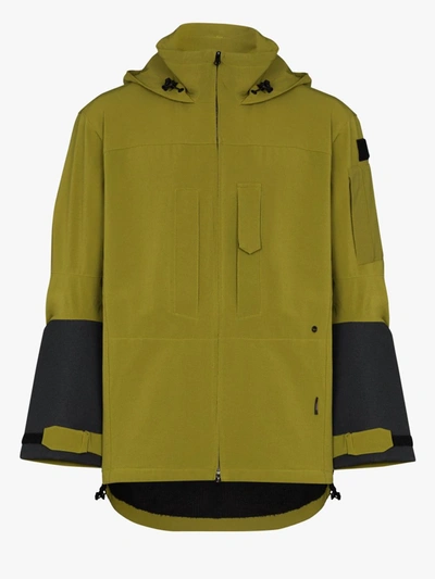 Shop Gr10k Schoeller Alpha Parka Coat In Green