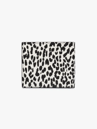 Shop Saint Laurent Black Animal Print Leather Wallet In White