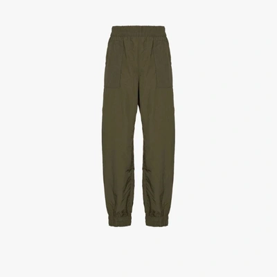 Shop Ganni Green Crinkled Track Pants