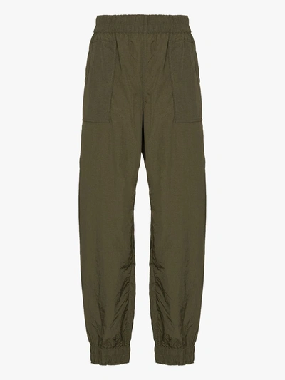 Shop Ganni Green Crinkled Track Pants