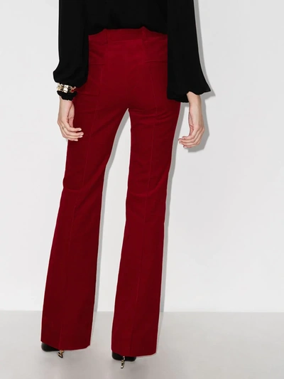 Shop Saint Laurent High Waist Corduroy Flared Trousers In Red