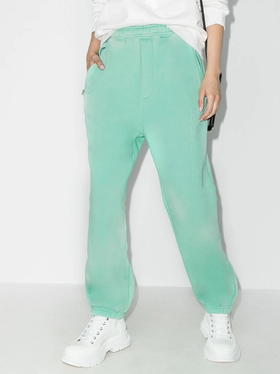 Shop We11 Done Bleached Logo Track Pants In Green