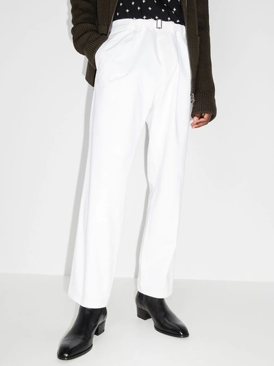 Shop Haider Ackermann Relaxed Belted Cotton Trousers In White