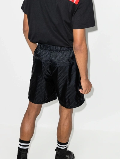 Shop Givenchy Logo Track Shorts In Black
