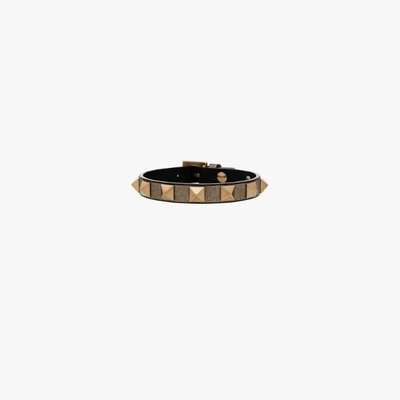 Shop Valentino Metallic Rockstud Leather Bracelet In Black