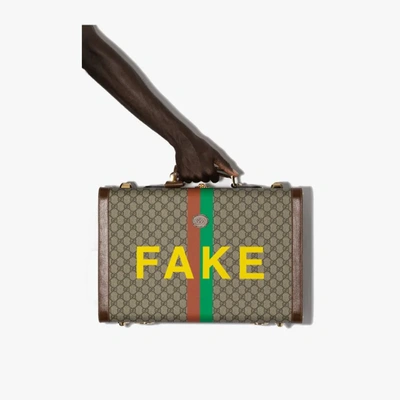 Shop Gucci Mittelgrosser ‘fake/not' Koffer In Brown
