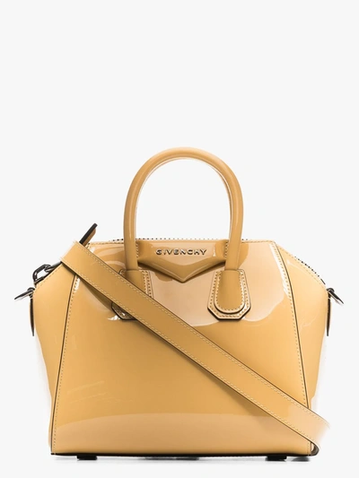 Shop Givenchy Yellow Antigona Patent Leather Top Handle Bag
