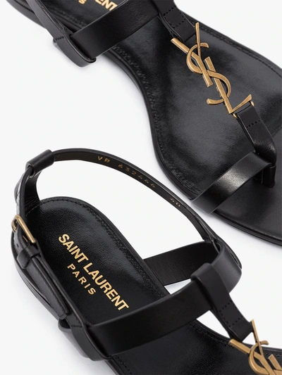 Shop Saint Laurent Cassandra Leather Sandals In Black