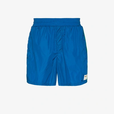 Shop Gucci Blue Web Stripe Swim Shorts