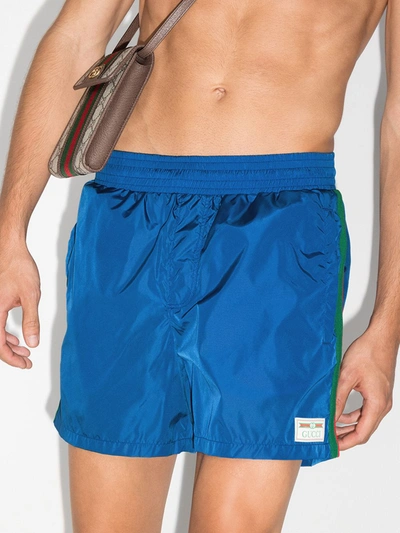 Shop Gucci Blue Web Stripe Swim Shorts