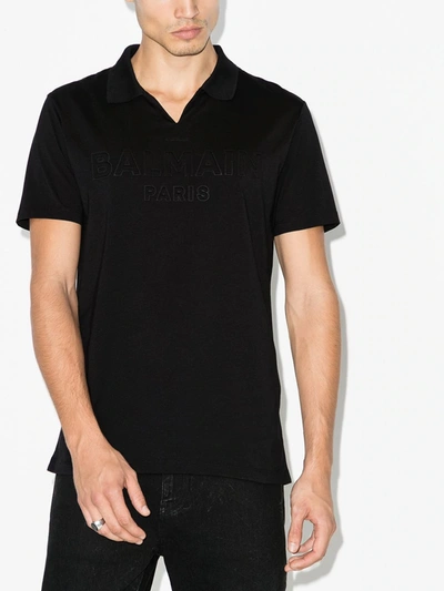 Shop Balmain Embossed Logo Polo Shirt In Black