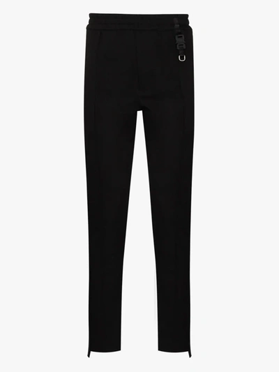 Shop Alyx Side Stripe Slim Leg Track Pants In Black