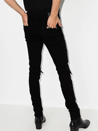 Shop Amiri Animation Slim Fit Jeans In Black