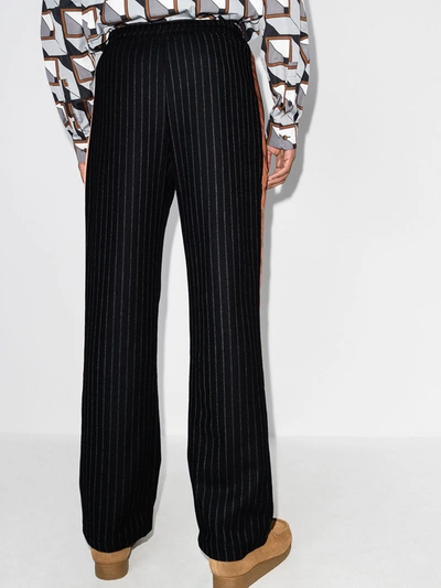 Shop Ahluwalia Kyle Pinstripe Wool Trousers In Black