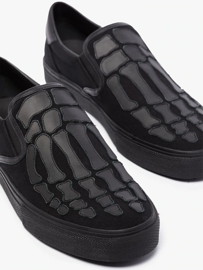 Shop Amiri Black Skeleton Slip-on Sneakers