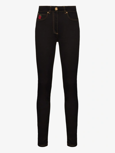 Shop Versace Rose Embroidered Skinny Jeans In Black