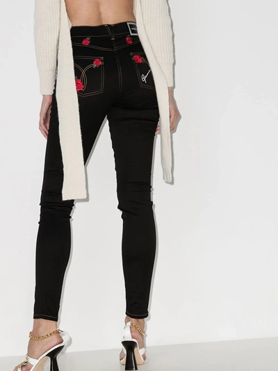 Shop Versace Rose Embroidered Skinny Jeans In Black