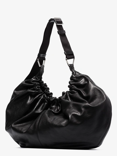 Shop Ganni Black Ruched Leather Shoulder Bag