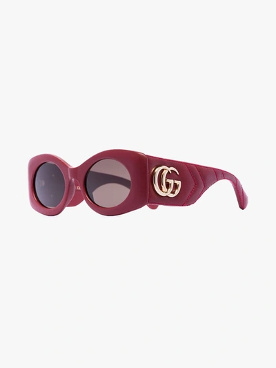Shop Gucci Red Matelassé Oval Sunglasses