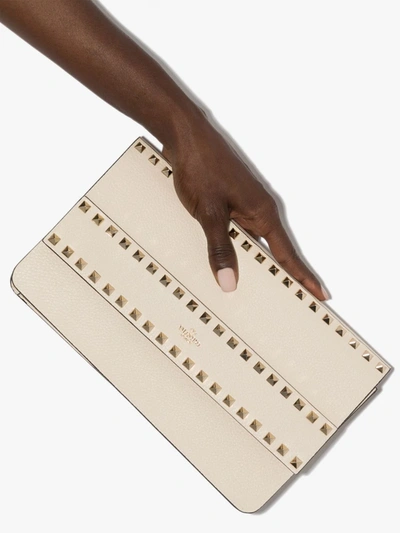 Shop Valentino Neutral Rockstud Leather Clutch Bag In Neutrals