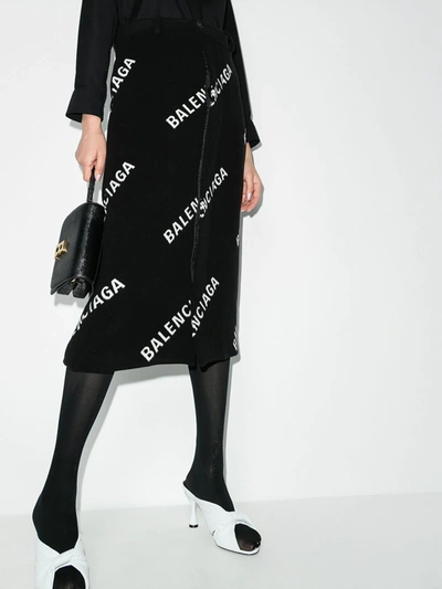Shop Balenciaga Logo Print Midi Pencil Skirt In Black