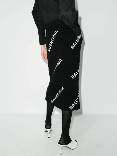 Shop Balenciaga Logo Print Midi Pencil Skirt In Black