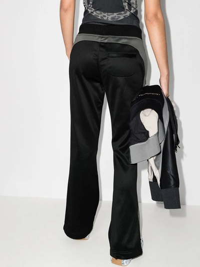 Shop Adidas By Stella Mccartney Logo Print Flared Track Pants In Black
