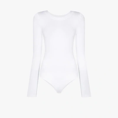 Shop Wolford Berlin Long Sleeve Bodysuit In White