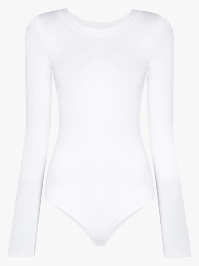 Shop Wolford Berlin Long Sleeve Bodysuit In White