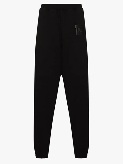 Shop Aries Temple Logo Cotton Sweatpants In Black