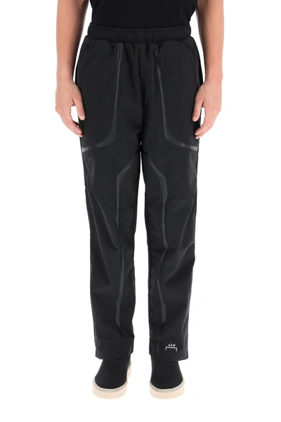 Shop A-cold-wall* A Cold Wall Nylon Pants With Logo In Black
