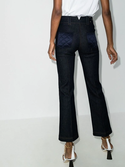 Shop Fendi Quilted Pocket Flared Jeans In Blue