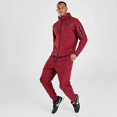 Shop Nike Tech Fleece Taped Jogger Pants In Red