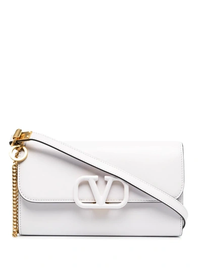 Shop Valentino Vsling Crossbody Bag In White