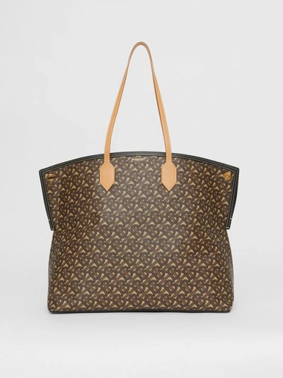 Shop Burberry Large Monogram E-canvas Society Tote In Bridle Brown